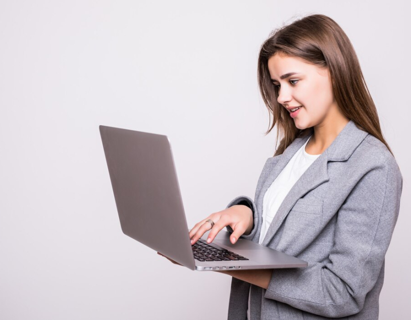 young-woman-working-laptop-isolated-white-background_231208-1837